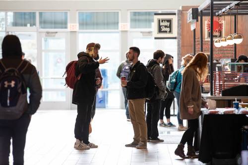 students talking in Kirkhof Center